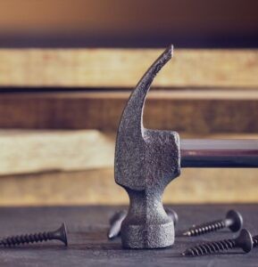 a hammer and screws